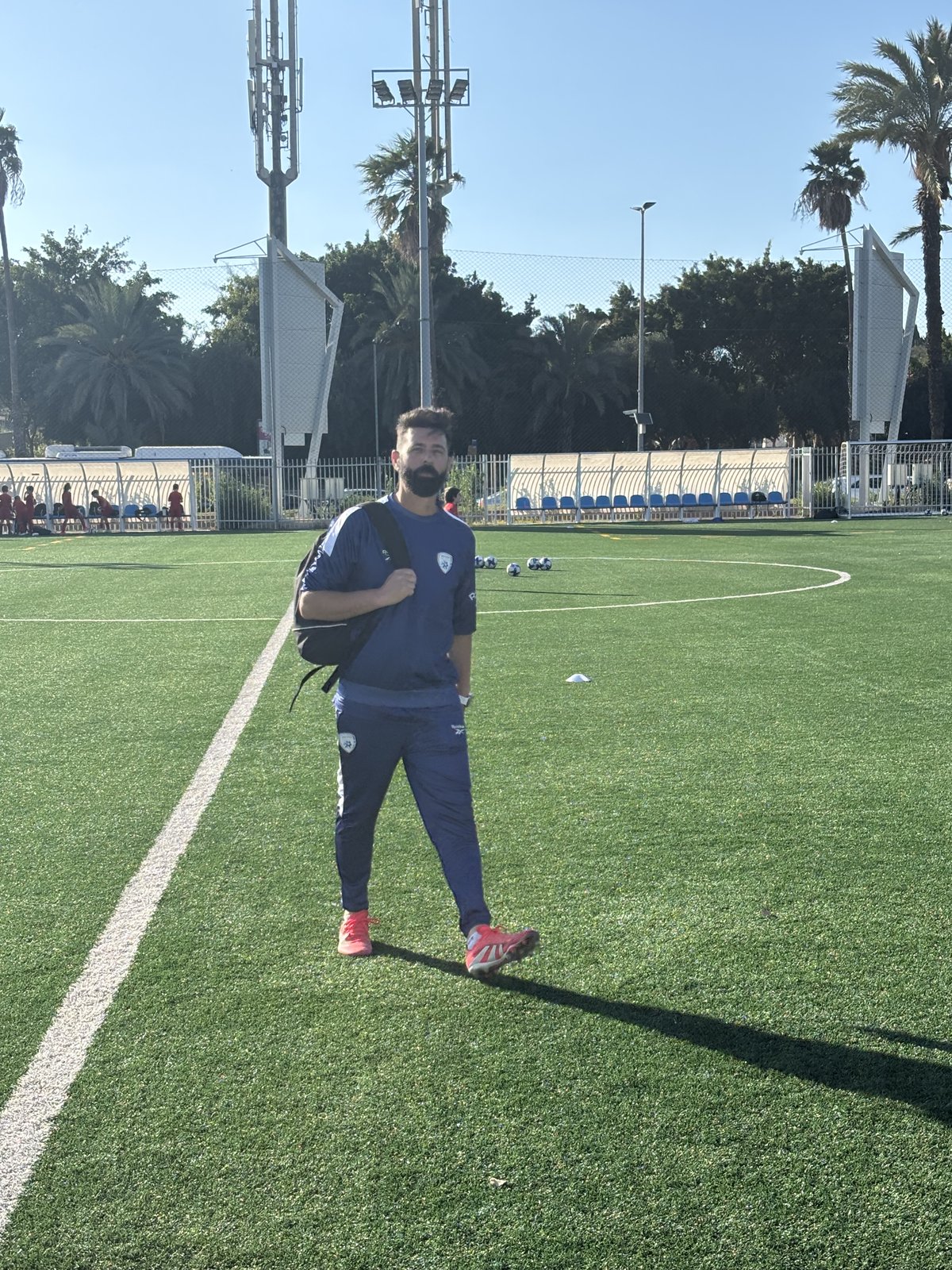 Coach Eyal Wiseman on the pitch at Hapoel Tel Aviv